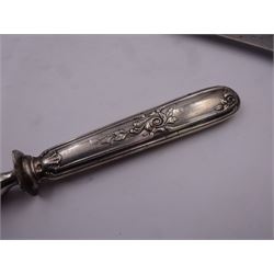 French two piece silver handled carving set, the handles with foliate decoration, marks indistinct, probably Minerva guarantee mark and makers mark, the knife blade stamped Paris, contained within a fitted case