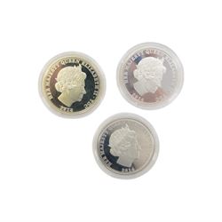 Two The London Mint Office 2009 9ct gold 1 gram half crown coins, Queen Elizabeth II Tristan Da Cunha 2014 'The World War One Centenary Silver Crown Set', The Royal Mint 2008 one ounce fine silver Britannia, United Kingdom 1986 brilliant uncirculated coin collection and other coins