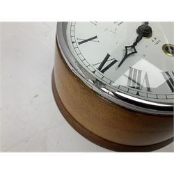 Wm. Smith & Son mahogany cased bulk head clock with chrome bezel, the enamel dial with Roman numerals marked A.M. 1942 D18.5cm; with winding key
