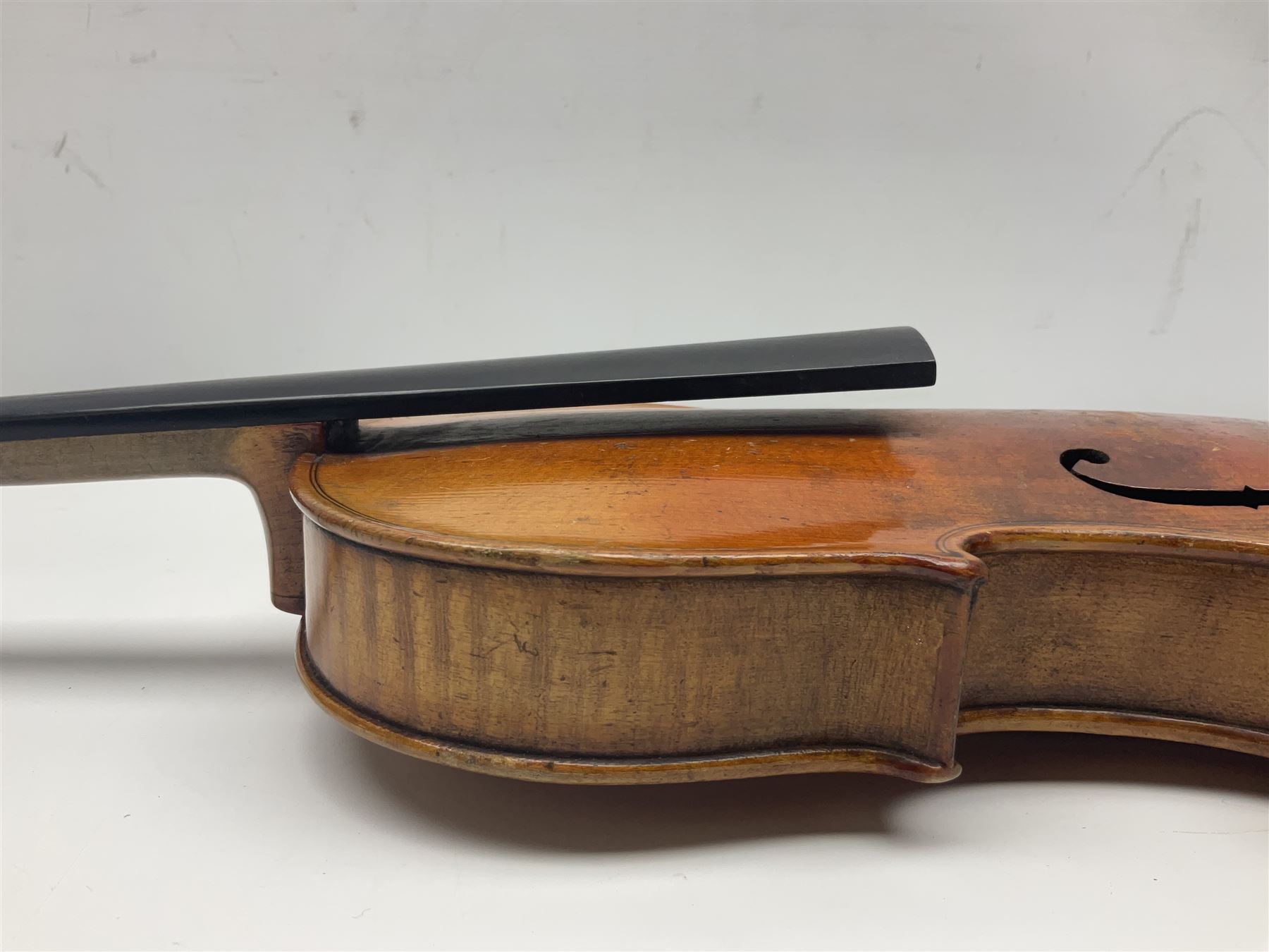 German violin c1900 for re-assembly with 36cm two-piece maple back and ribs and spruce top; L59cm; in ebonised wooden 'coffin' case with two bows