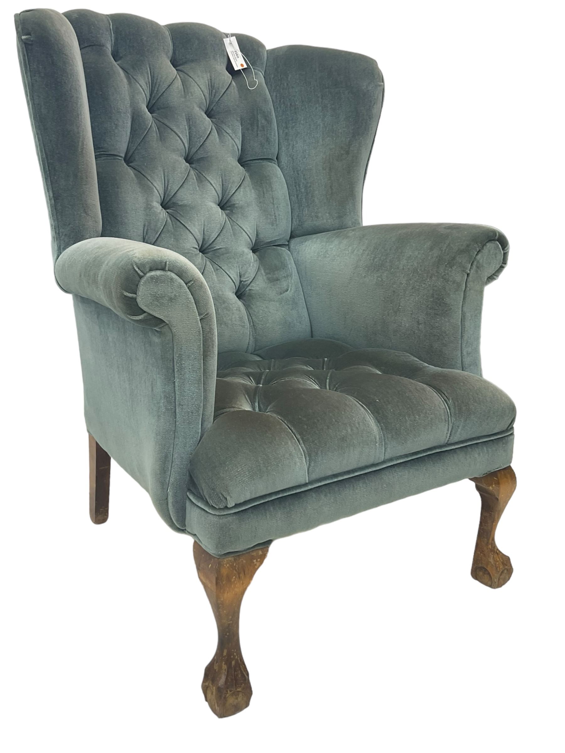 Georgian design wingback armchair, traditional shape with rolled arms, upholstered in teal velvet fabric, on cabriole supports with ball and claw feet