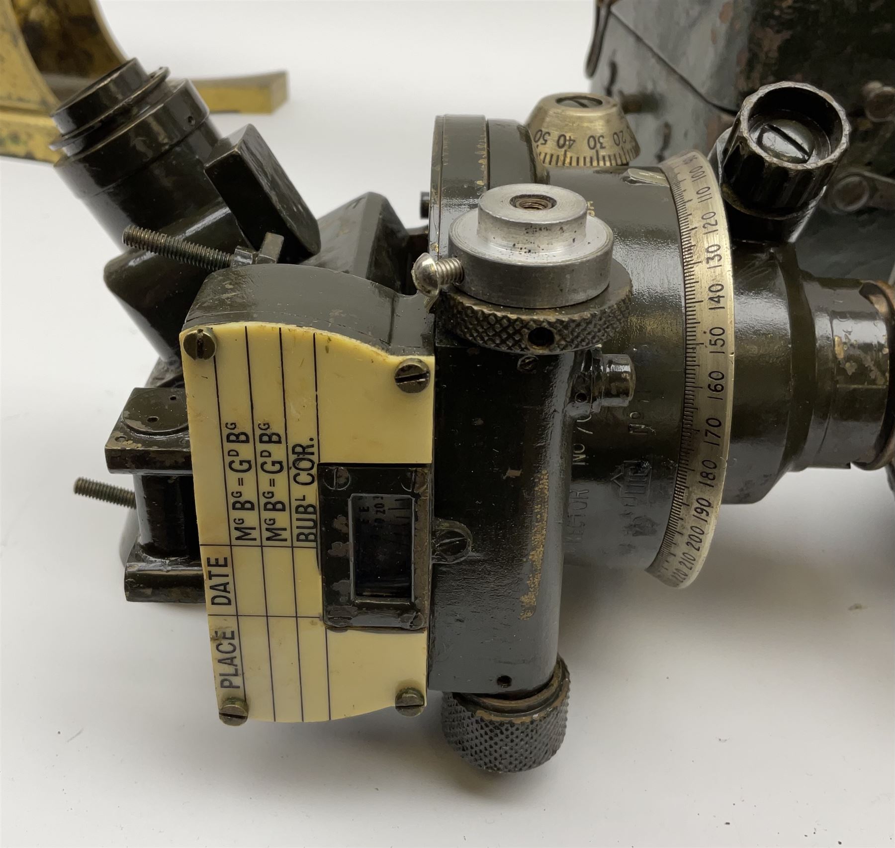 WW2 green painted brass military artillery theodolite, marked 'Director No.7 (Mk.2) OS 1873 GA', dated 1942, serial no.11435, on oak and brass telescopic tripod with green painted metal carrying case; together with five additional unrelated oak and brass telescopic tripod legs