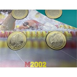 The Royal Mint Queen Elizabeth II 2002 Manchester Commonwealth Games four coin two pound coin  set in card display
