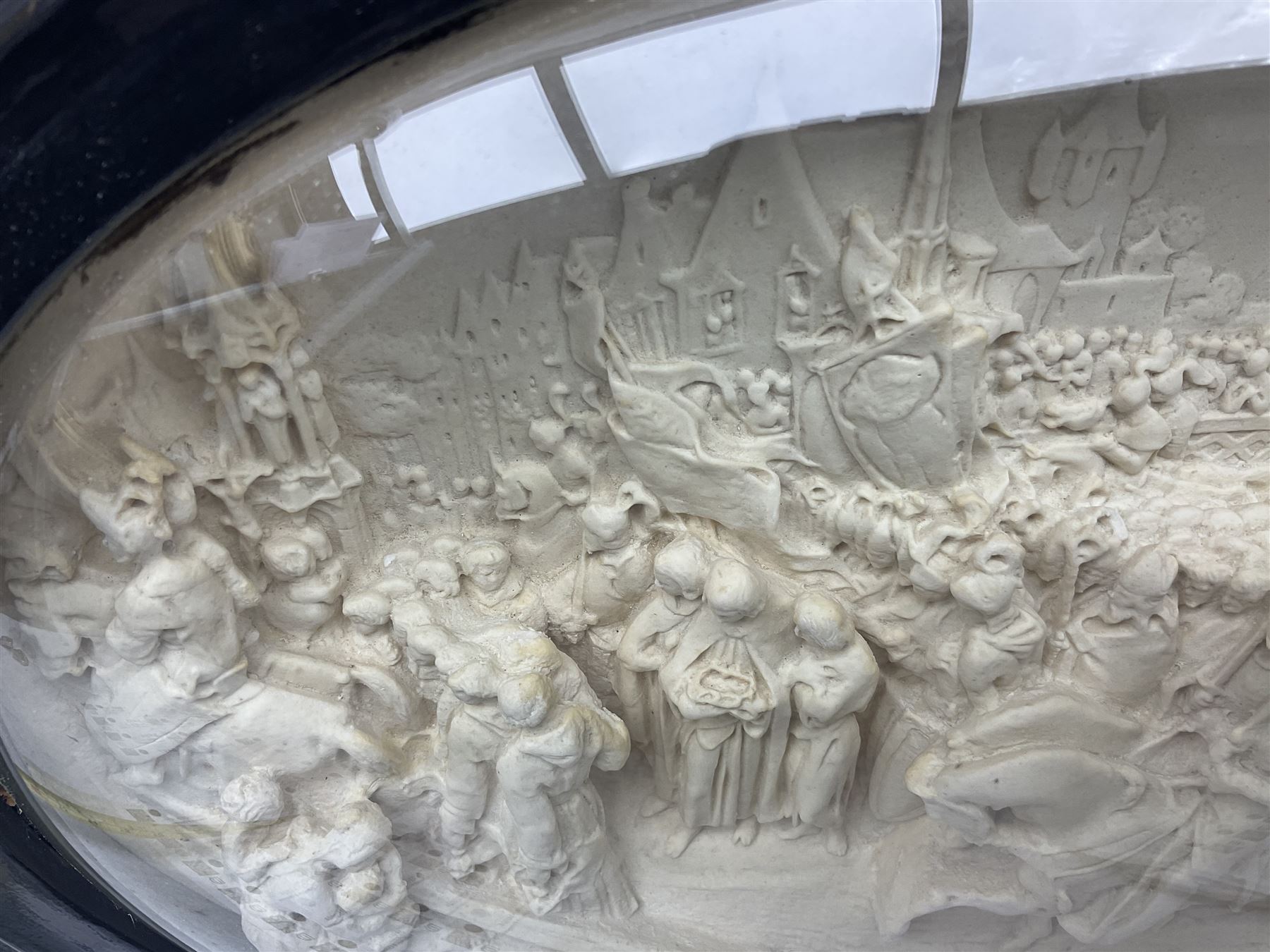 Justin Mathieu; oval high relief plaque depicting a battle scene, within frame H36cm