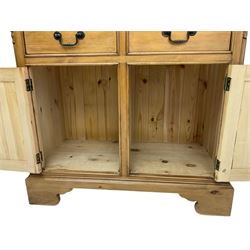 20th century pine dresser, three tier rack over two drawers and cupboards