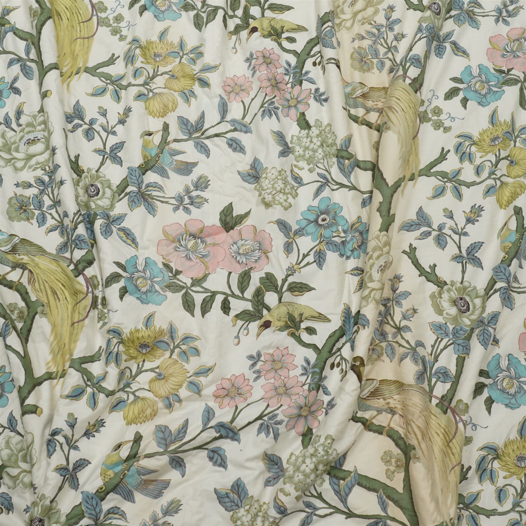 Pair of large quality full length lined and padded ivory ground curtains profusely decorated with birds of paradise and exotic flora, in a predominantly pastel palette

Pelmets W 335cm