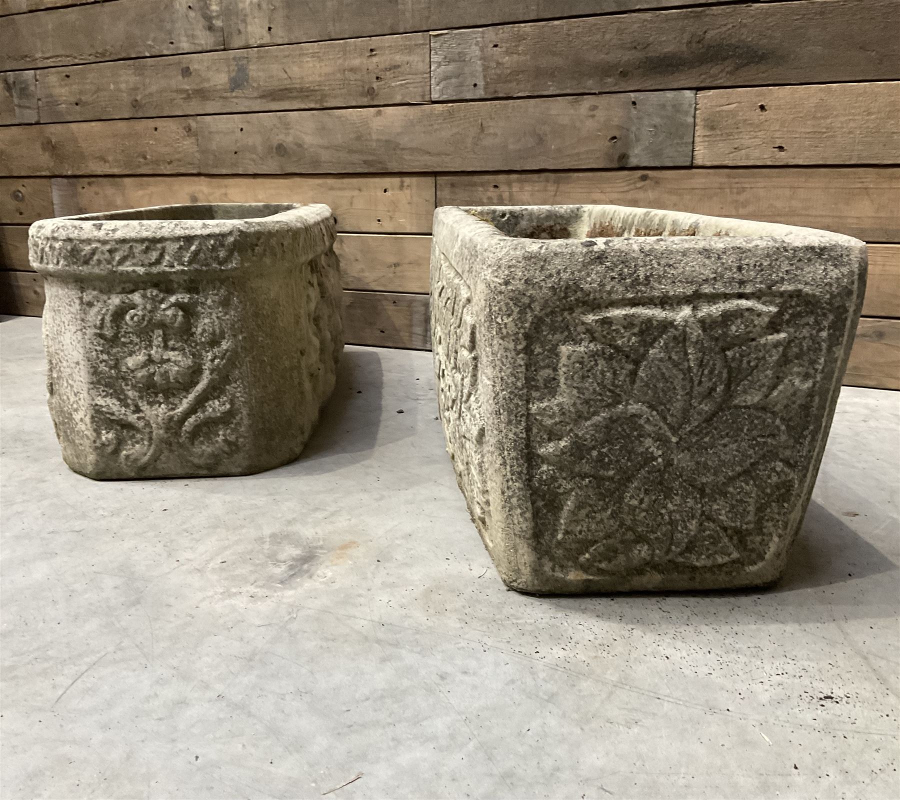 Ornate cast stone rectangular garden planter, lion mask and swag detail, and s similar planter (2)