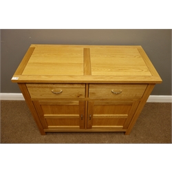  Light oak sideboard, two drawers and two cupboards, W101cm, H83cm, D48cm  