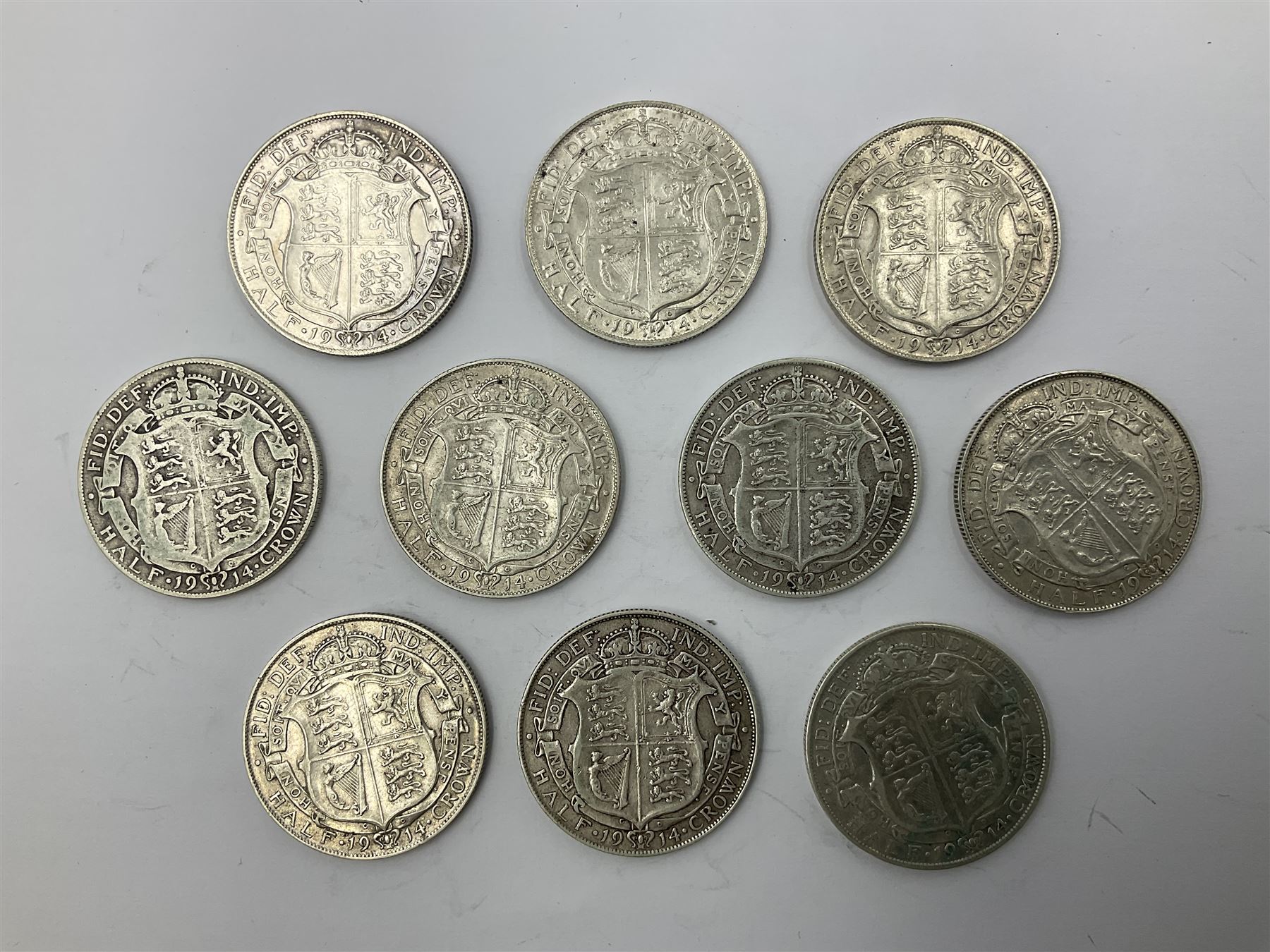 Ten King George V 1914 silver half crown coins