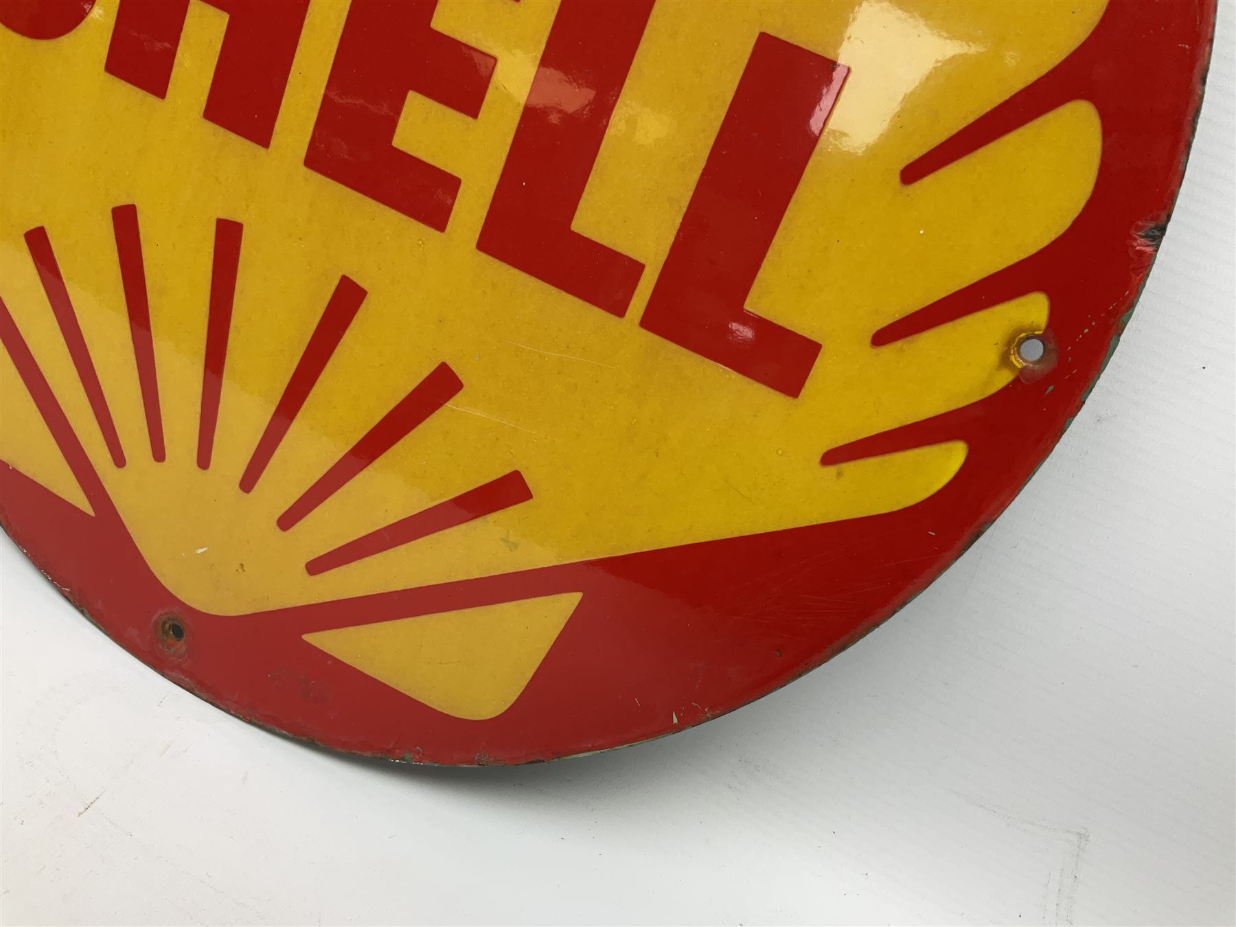 Circular enamelled red and yellow sign depicting Shell logo and text, D40cm