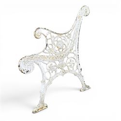 Pair of ornate painted cast iron bench ends, painted in white finish