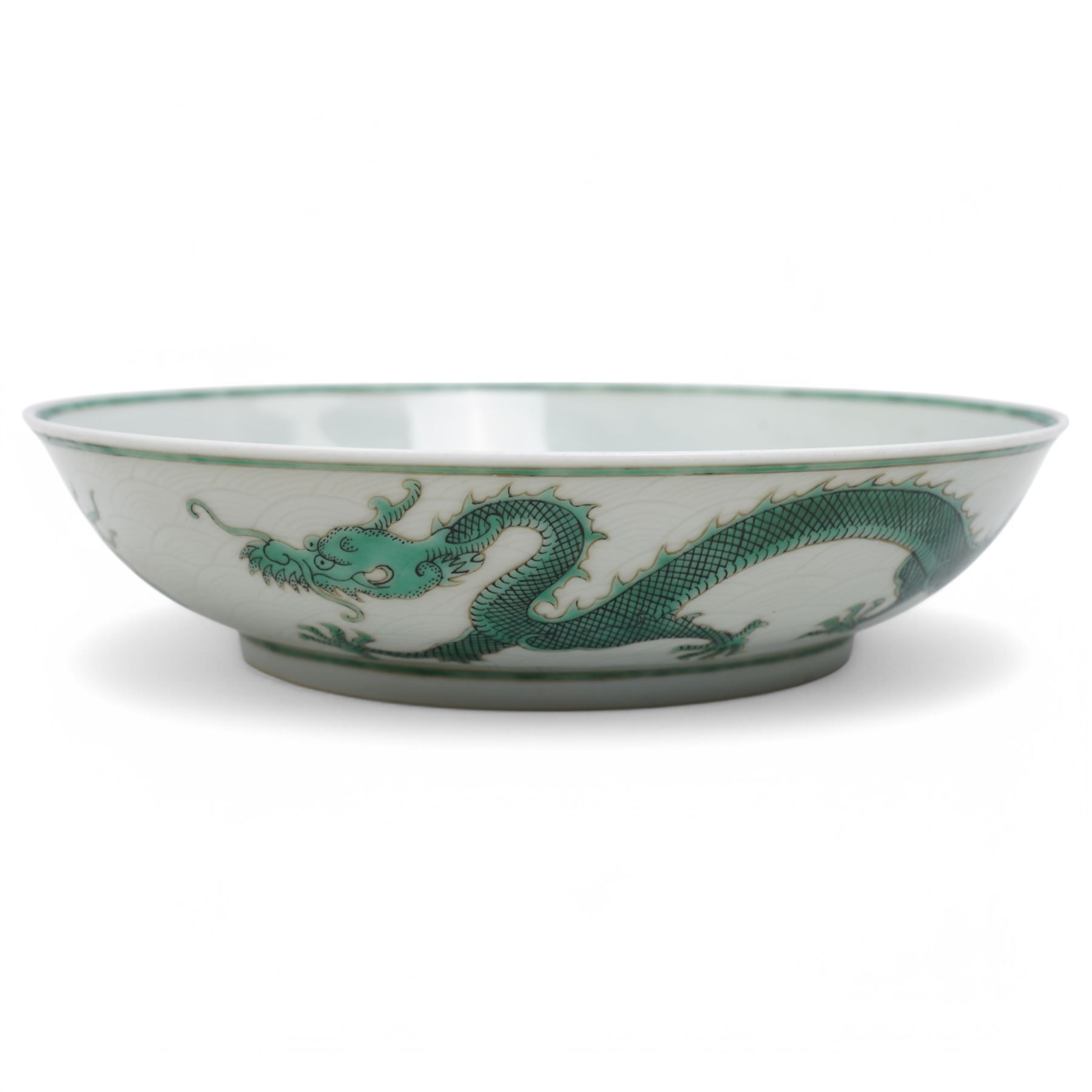 Chinese Guangxu period green and white bowl decorated with dragons on a scaled ground, character mark to base D18.5cm