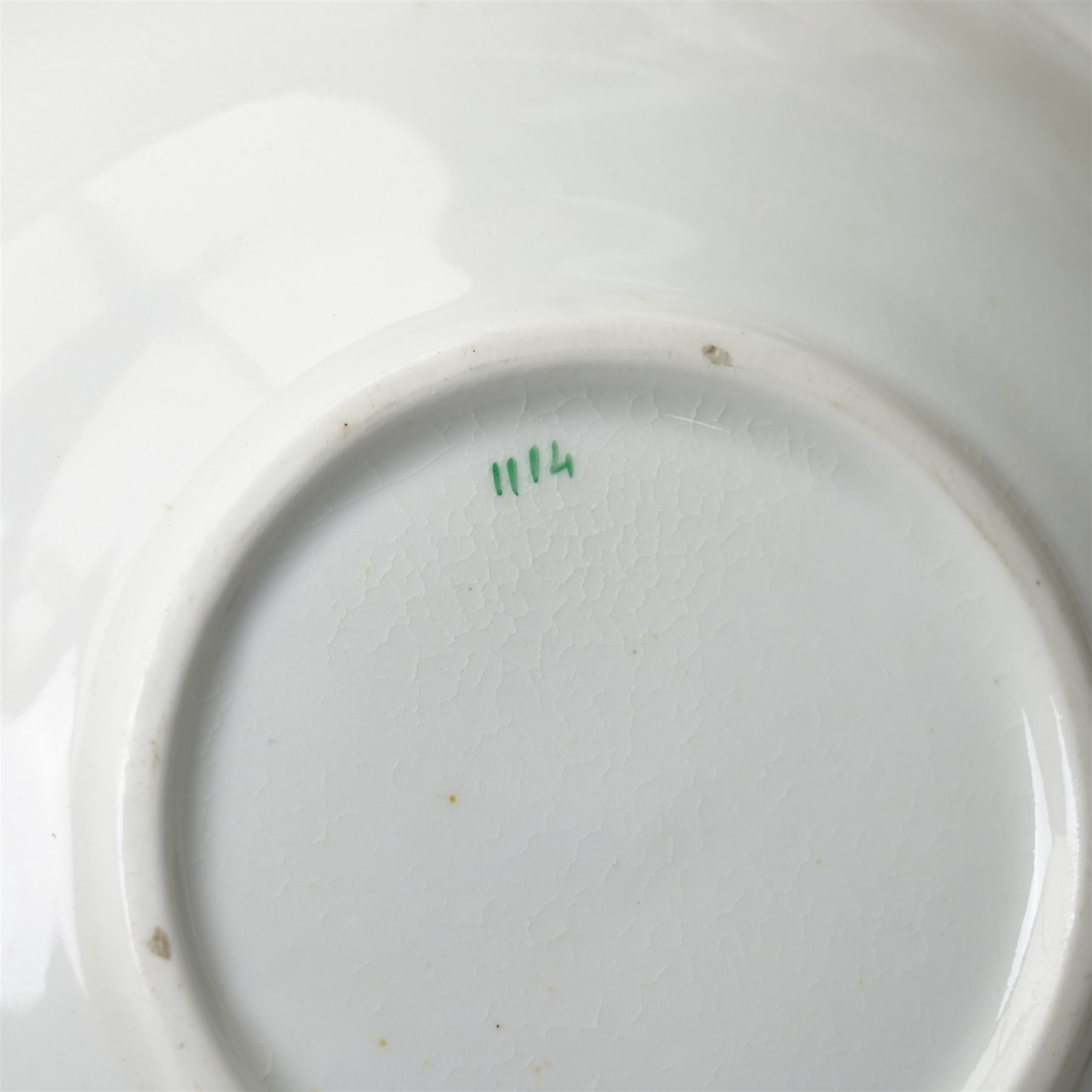 19th century English porcelain tea service, possibly Coalport, comprising teapot, covered sucrier, ten teacups and saucers, slop bowl, milk jug, and two serving dishes