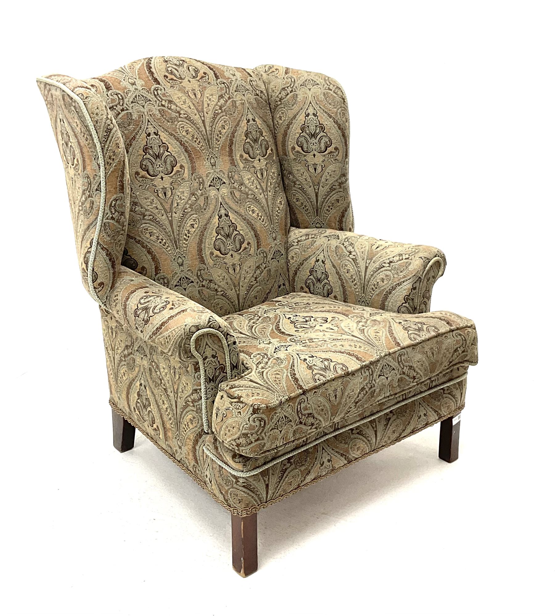 Georgian style wing back sprung armchair, upholstered in stylised patterned fabric, square supports 