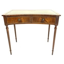 Reproduction Georgian style mahogany writing table, reverse bow front with green leather inset, two frieze drawers, turned and fluted supports 
