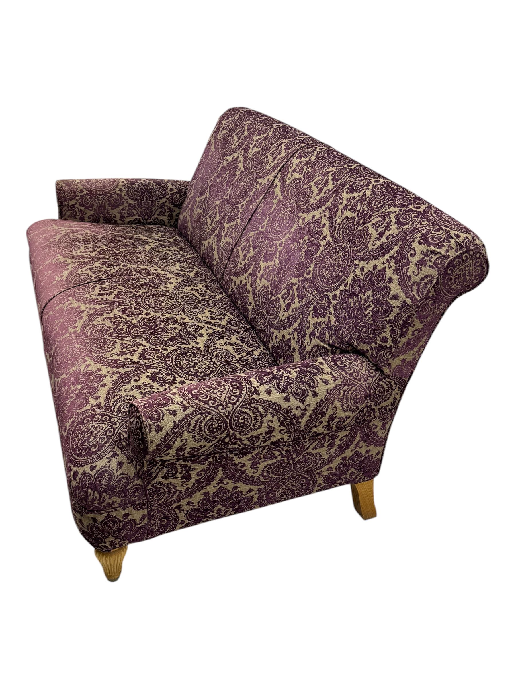 Multi-York - contemporary two-seat sofa, upholstered in damask fabric in shades of burgundy and beige, raised on turned and fluted supports; complete with matching footstool