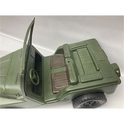 Action Man - five figures marked on the back 'Made in England by Palitoy under licence from Hasbro 1964', one dressed as a German Stormtrooper, one as a Red Devil Pilot and three in army uniform; another similar action figure marked to the right buttock ' G.I. Joe Copyright 1964 by Hasbro Patent Pending Made in Canada' dressed in army uniform; together with an Action Man jeep, field gun, mortar and machine guns and other accessories including helmets and weapons, parachute, diving equipment, skis and snow shoes, boots, uniforms etc; all unboxed