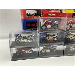 Fifty-one die-cast models of motorcycles by Maisto, Protar Italeri, Welly etc; many in perspex display boxes, some in window boxes and some unboxed