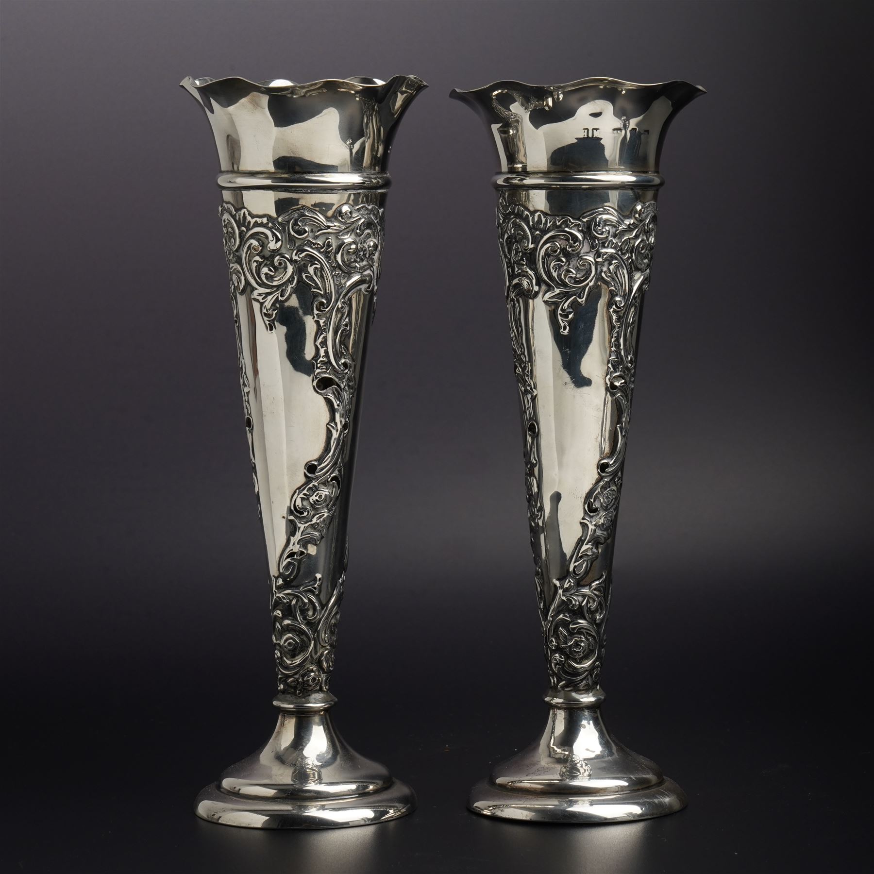 Pair of embossed silver trumpet shape vases H21cms marks rubbed but maker Henry Matthews and another pair of plain vases H15cm Sheffield 1913 Maker Lee & Wigfull