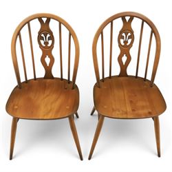 Ercol - Set of four dark elm 'Fleur De Lys' chairs