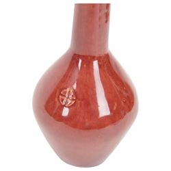 Early 20th century Jugenstijl vase by Aardewerkfabriek De Kat, Bergen op Zoom Pottery (1902-1918) attributed to Chris van der Hoef, of angular form with elongated tapering neck with flared rim, in pinkish red glaze with cross motif to the body, impressed marks beneath, H31cm