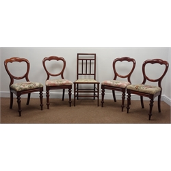  Four Victorian mahogany spoon back dining chairs, upholstered drop on seats, turned supports and an inlaid Edwardian bedroom chair  