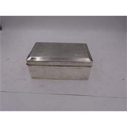1920s silver mounted cigarette box, of rectangular form, with engine turned decoration to stepped hinged cover, opening to reveal soft wood lined partitioned interior, hallmarked William Neale & Son Ltd, Birmingham 1926, H6.3cm