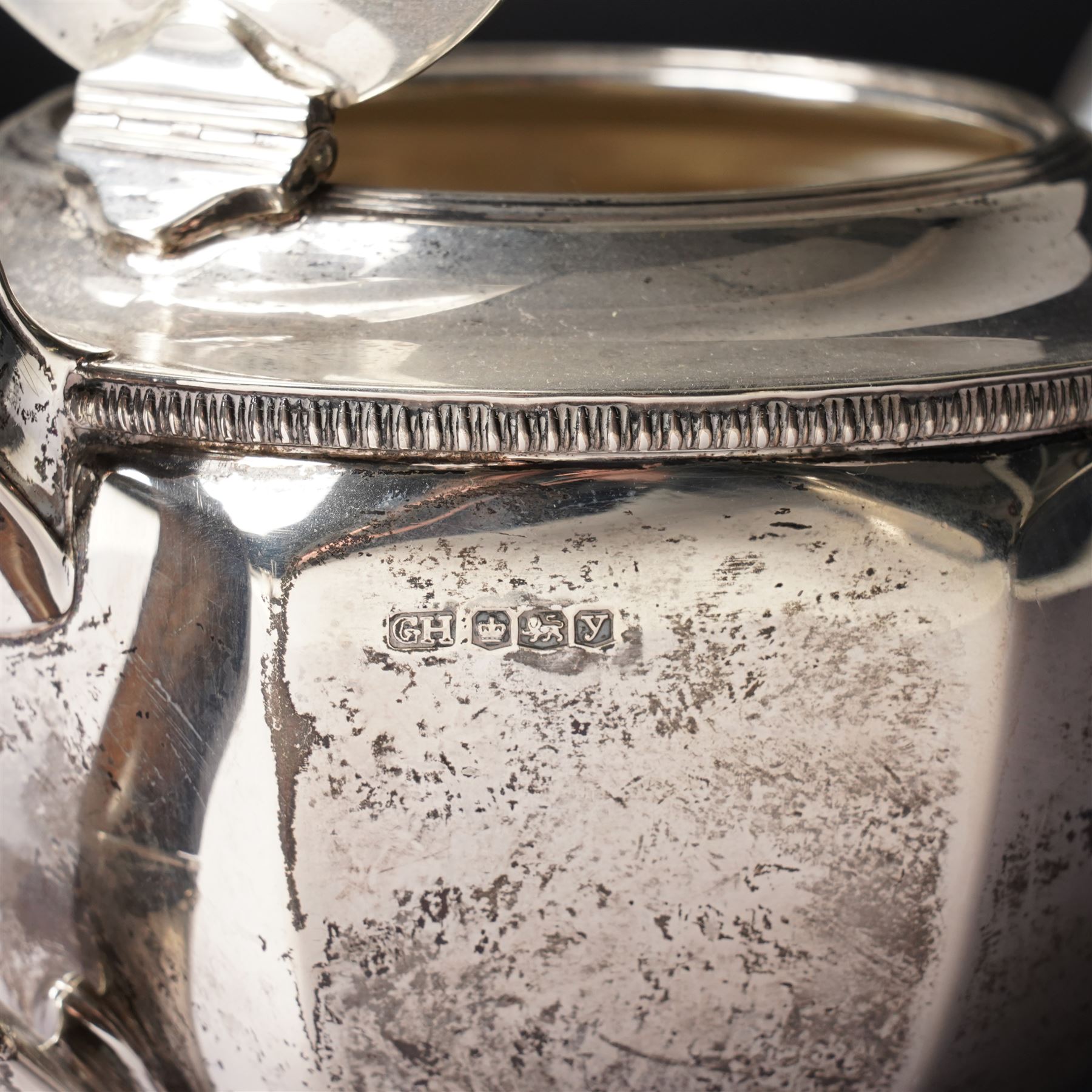  Silver tea set comprising teapot, hot water jug, sugar bowl and milk jug of circular panel sided design Sheffield 1941 Maker Harrison Brothers & Howson 