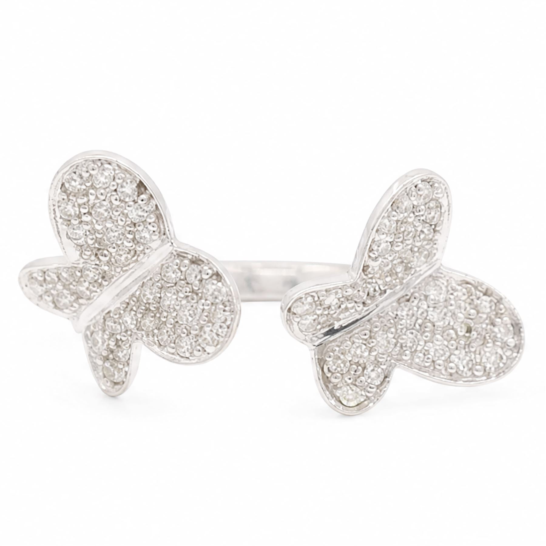18ct white gold diamond butterfly ring, pave set with single cut diamonds, stamped 750