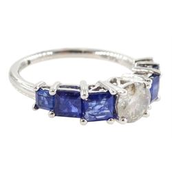 Platinum seven stone diamond and sapphire ring, the principal round brilliant cut diamond of approx 0.70 carat, with three princess cut sapphires set either side, hallmarked, total sapphire weight approx 1.95 carat