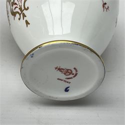Royal Crown Derby Imari pattern single handled vase, circa 1897, together with two 1126 Imari pattern plates and a saucers, 2451 imari pattern plate and 6299 Imari pattern miniature jar, all with printed marks beneath 