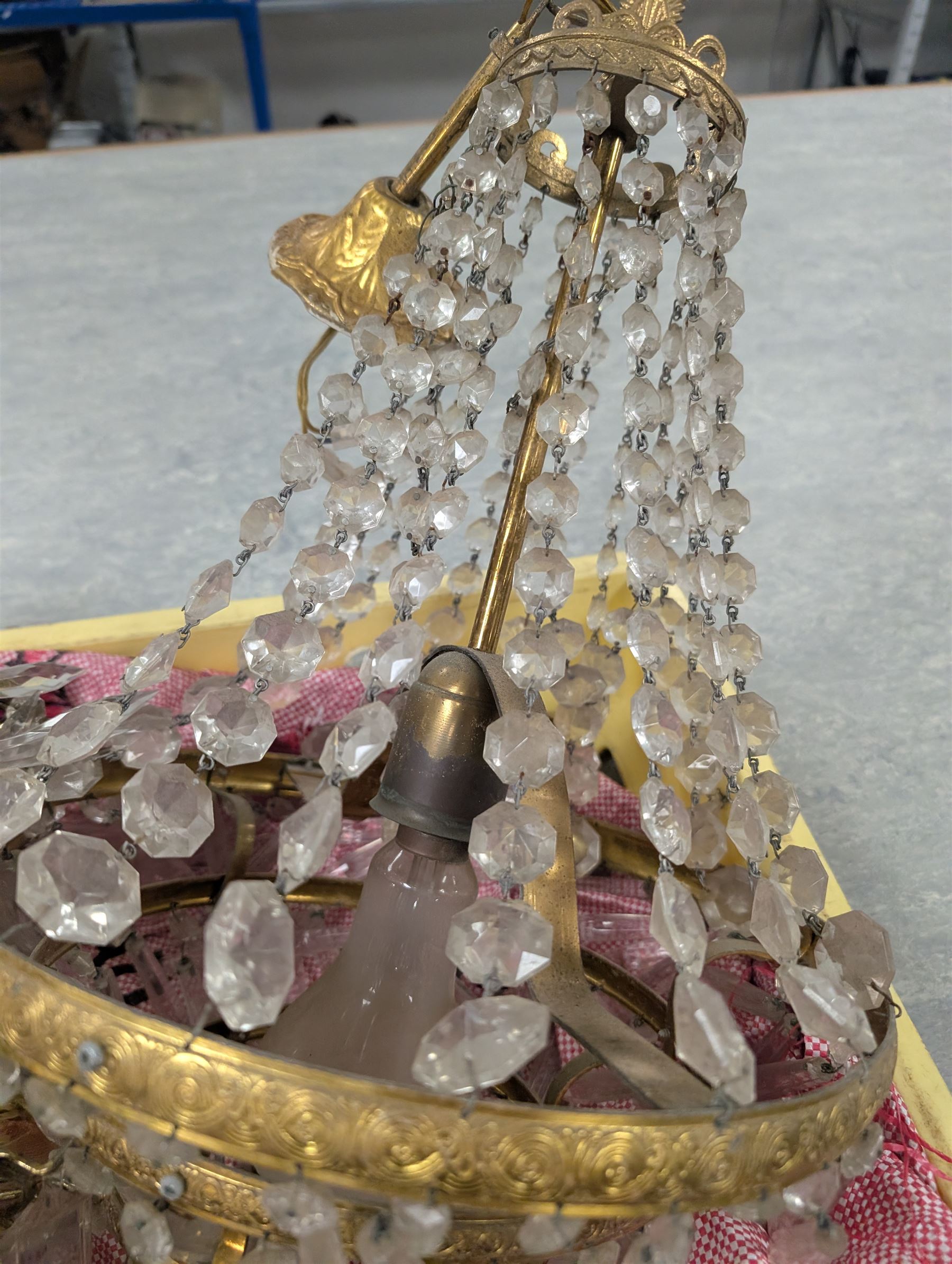 Four brass and glass chandelier light fittings