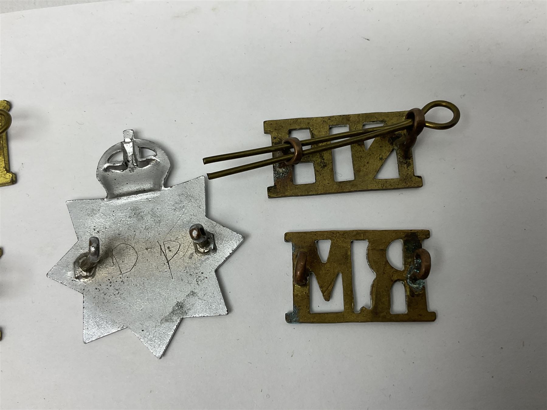 Two Services Rendered badges Nos.B23060 and B201341; two MSO BAOR (Mixed Services Organisation British Army of the Rhine) badges; small quantity of shoulder titles, lapel/sweetheart brooches, buttons and non-military related items