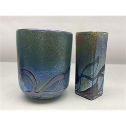 Two Isle of White glass vases, by Alum Bay Glass, both with blue swirl design upon an iridescent mottled blue/green ground, together with a Gozo Glass vase of pebble form, with similar design, H12cm
