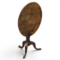 19th century elm tripod table, circular plank top construction tilt-top, raised on a turned column, supported on cabriole legs 