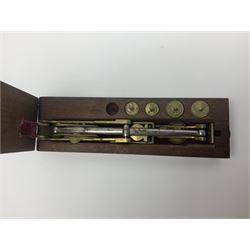 Brass sovereign scales and a part set of Georgian folding sovereign scales (one weight missing)