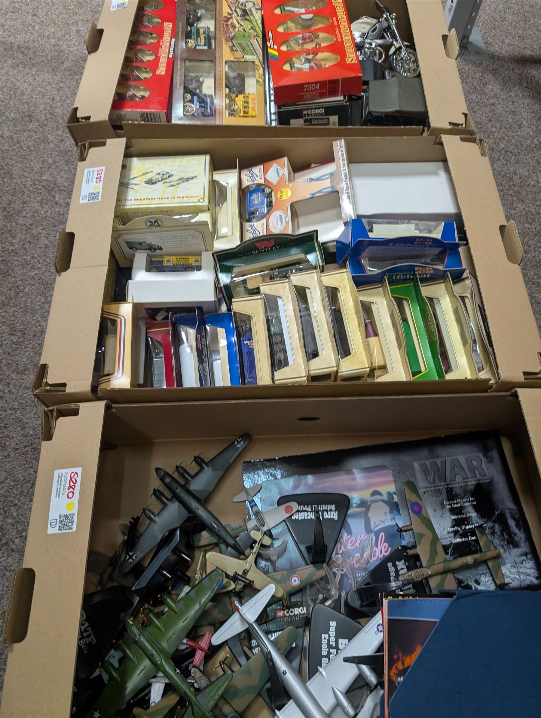Collection of diecast model vehicles, including Corgi, Lledo and Matchbox, Atlas Editions aeroplanes and Britains soldiers, in four boxes