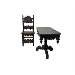 Late 19th century Gothic revival carved oak pedestal table, rectangular top with carved edges, apron carved with trailing foliate and scrolled decoration, heavily detailed column with scrolling decoration and floral carvings, the tripod base with cabriole supports carved with flowerheads (93cm x 53cm x 75cm; Late 19th century carved oak hall chair, panelled back rails with extending scroll decoration (51cm x 40cm x 116cm)