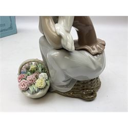 Three Lladro figures, comprising Pondering, no 5173, Nostalgia, no 5071 and Nature's Bounty, no 1417, all with original boxes, largest example H27cm