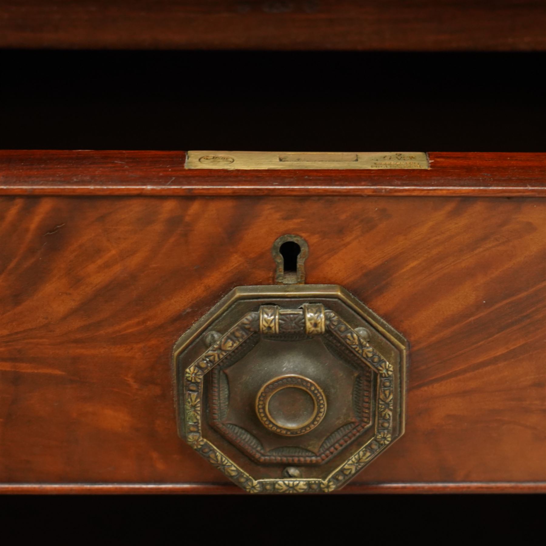 Maples & Co. Edwardian mahogany bureau bookcase, projecting moulded cornice over two astragal glazed door, panelled hinged lid over two drawers and double cupboard, on bracket feet