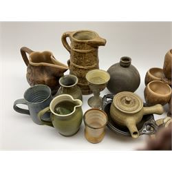 Collection of studio pottery, to include Borgh pottery twin handled bowl, Hillstonia naturalistically modelled jug, set of seven mugs, jug and two vases.