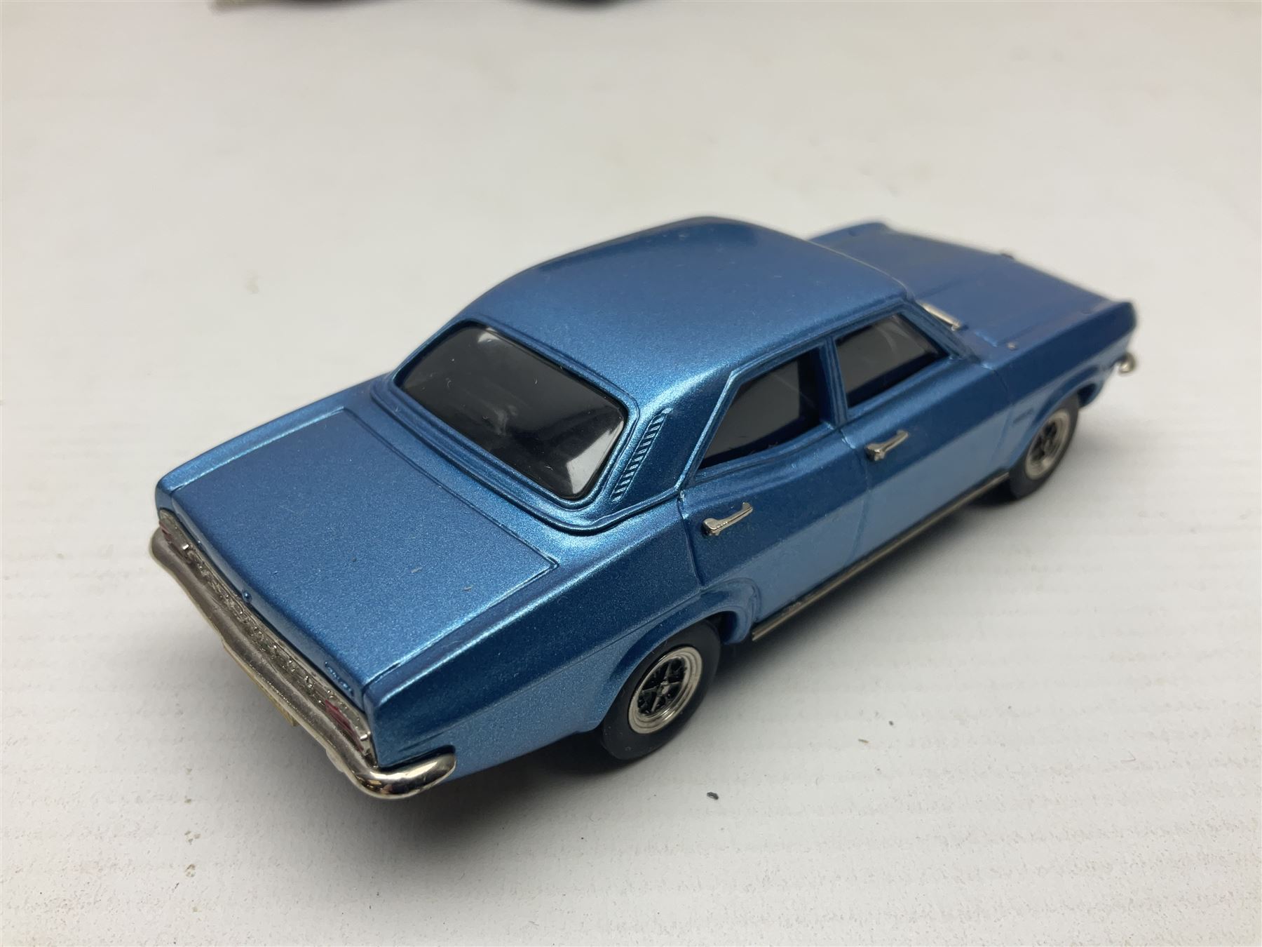 Three Lansdowne Models 1:43 scale models - 1956 Willerby Vogue Caravan; 1960 Bedford Dormobile Romany De-Luxe in green and white; and 1972 Vauxhall VX4/90 (Sapphire Starmist-met); all boxed (3)