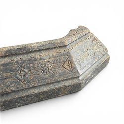 Late Victorian cast ion bedroom fireplace, decorated with floral poppy motifs and flluting