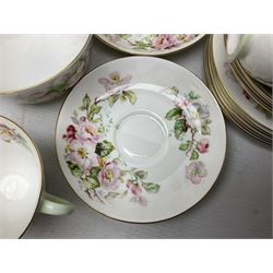 Royal Doulton Apple Blossom pattern tea service for twelve, comprising twelve saucers, twelve tea plates, twelve teacups, milk jug, sucrier and two cake plates