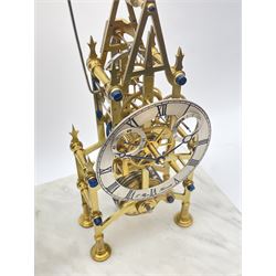Late 20th century brass Gothic style skeleton clock, silvered Roman chapter ring with subsidiary seconds dial, single chain fusee movement, single strike on bell on hour, six spoke escapement wheel with anchor escapement, in brass and bevel glazed casing with winding hole, on moulded white marble base