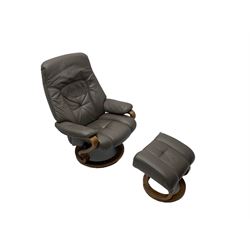 Himolla - reclining swivel armchair, upholstered in grey leather; and matching footstool