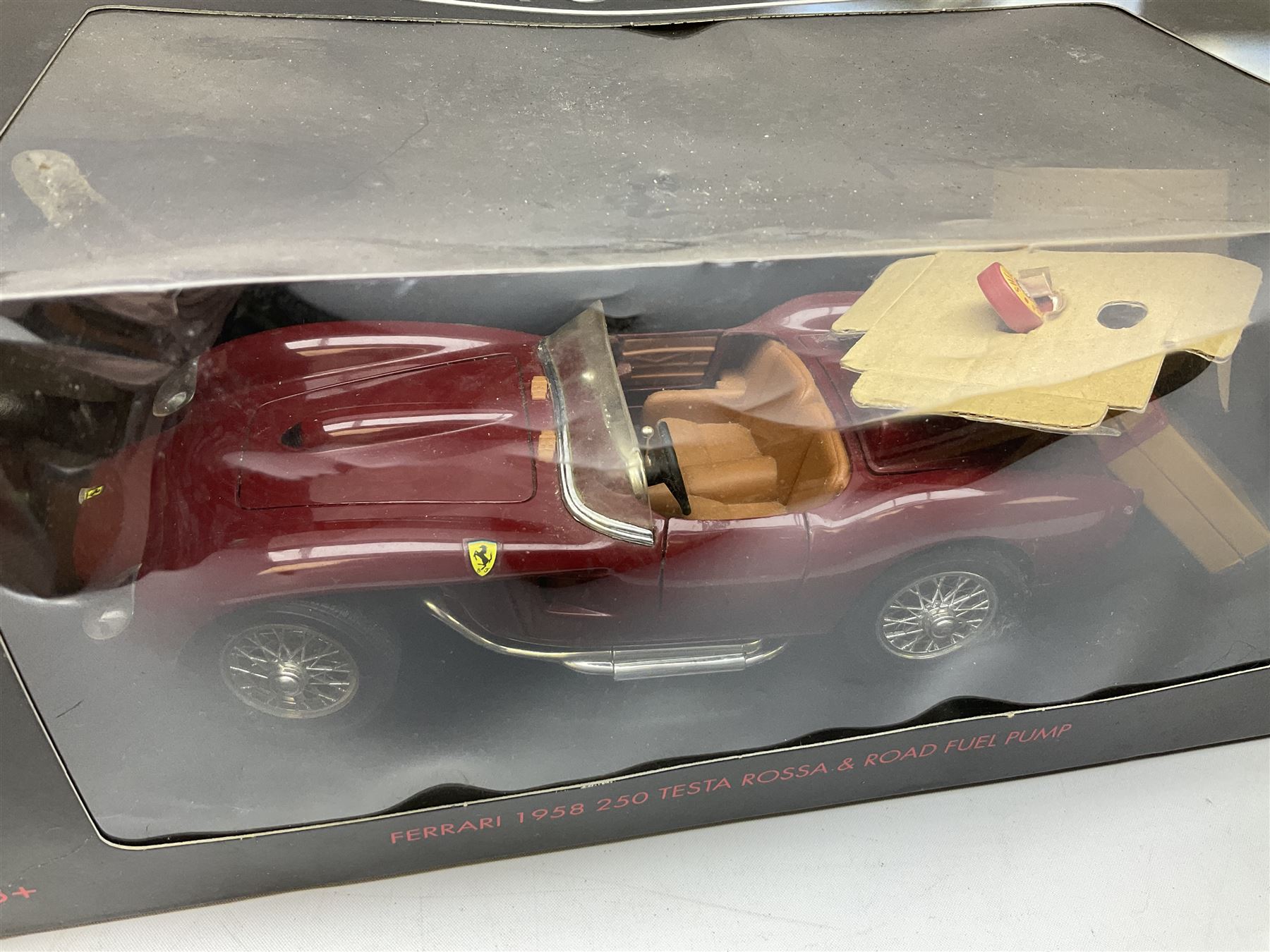 Two Collezione Classico large scale die-cast models of a Ferrari 1972 312P with Racing Fuel Pump and Ferrari 1958 250 Testa Rossa with Road Fuel Pump; and two Minichamps 1:18 scale models of a McLaren Mercedes Racing Car and Auto Union Typ C racing car; all boxed (4)