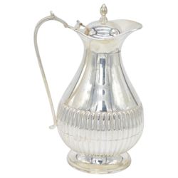 Late 20th century Indian Colonial silver six piece tea and coffee service, comprising coffee pot, hot water pot, teapot, milk jug, open sucrier and tray, all of oval part fluted form, the tea and coffee pot with ebonised wooden handles and finials, stamped SIL and with maker's mark for Cooke & Kelvey New Dehli, within two boxes and with original receipt for 1999