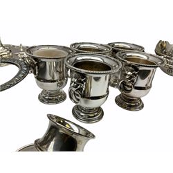 Sliver napkin ring, hallmarked Harry Atkin, Sheffield 1943, together with collection of silver plate, including punch bowl on stand with vine decoration, a Victorian style teapot with embossed foliate decoration and bird finial, tea set comprising teapot, sugar bowl and milk jug, a selection of serving trays, etc. 