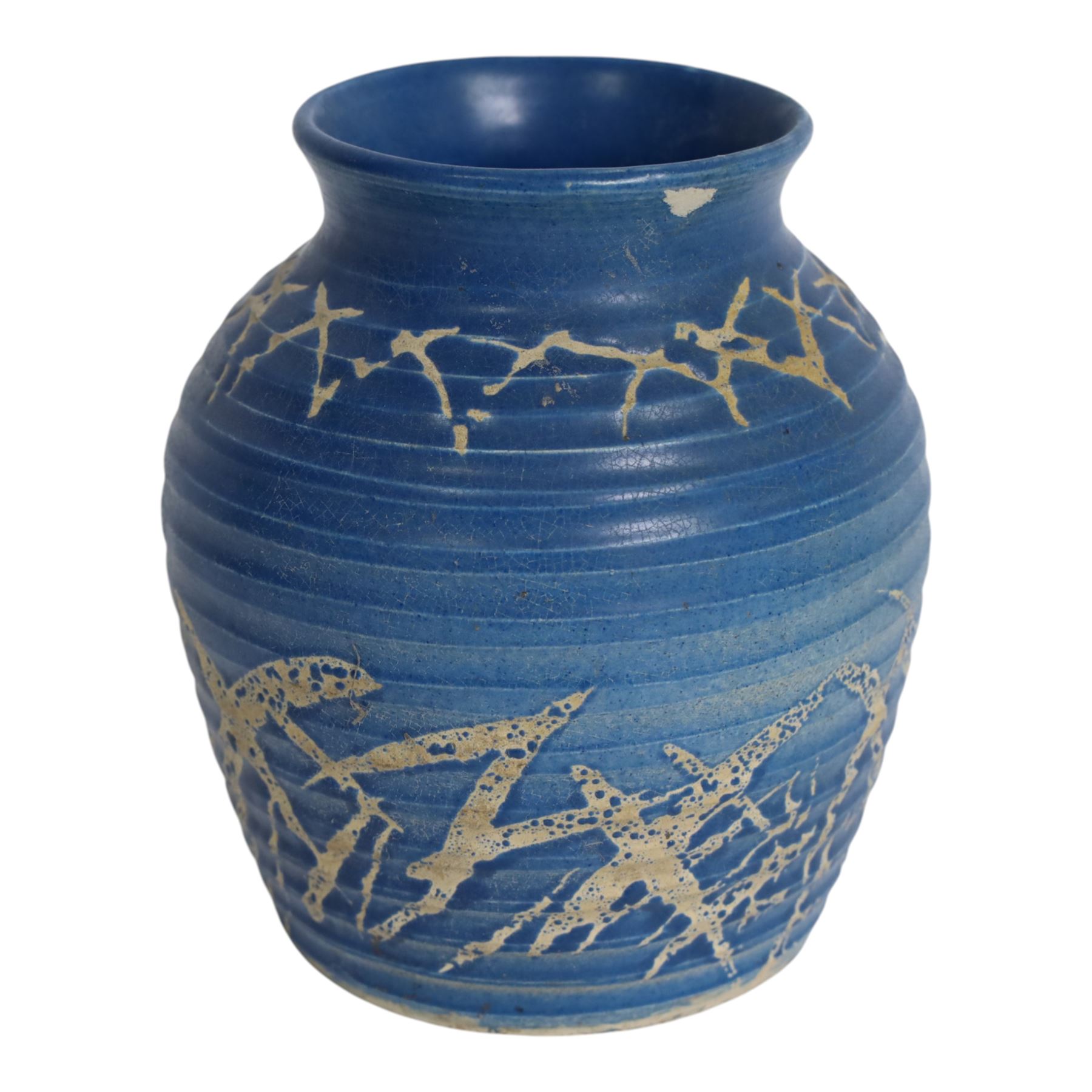 Quentin Bell 1910-1996: ribbed vase with fluted rim, decorated in white abstract design on a blue ground, signed Bell beneath, H16cm 